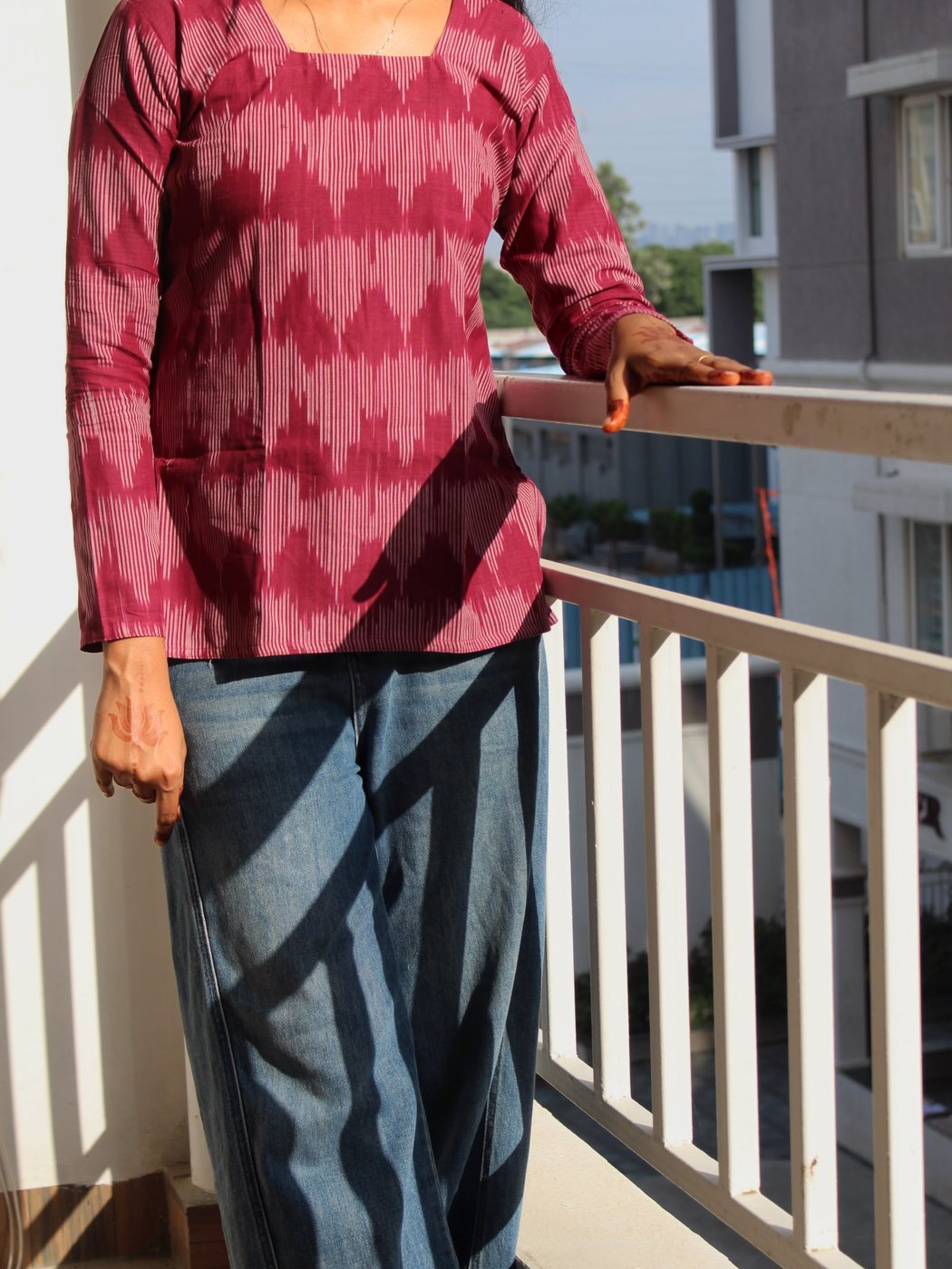 Arunima — front view showing the square neckline and sleeve cuff