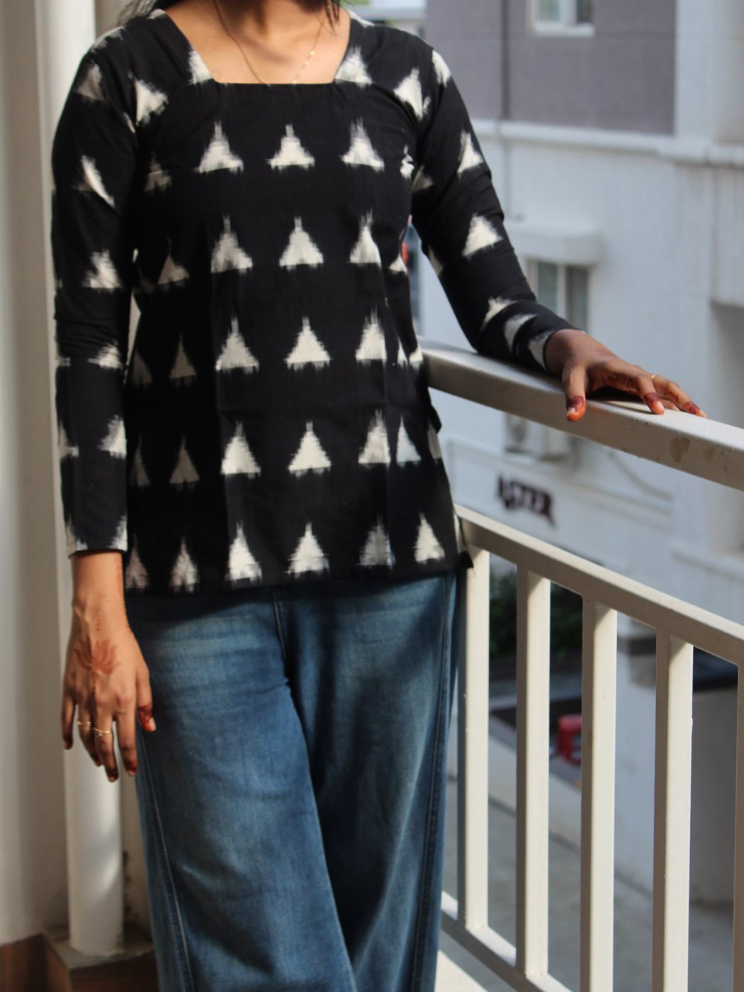 Trikona — front view showing the square neckline and full sleeves