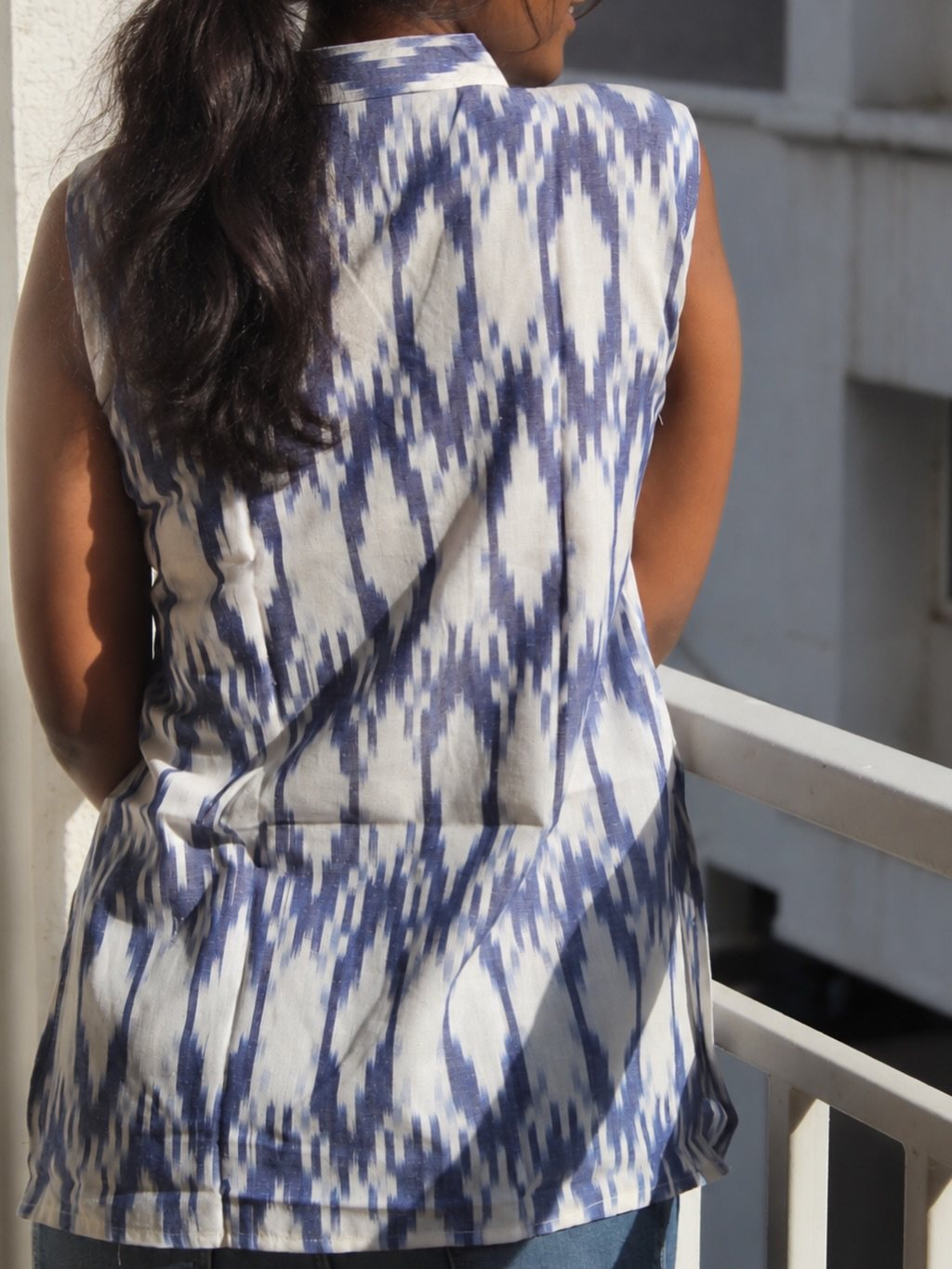 Vanya in Blue — back view showing the clean, uninterrupted back